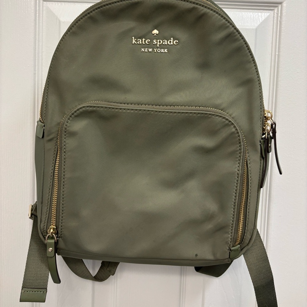 Kate Spade medium size vinyl backpack.
